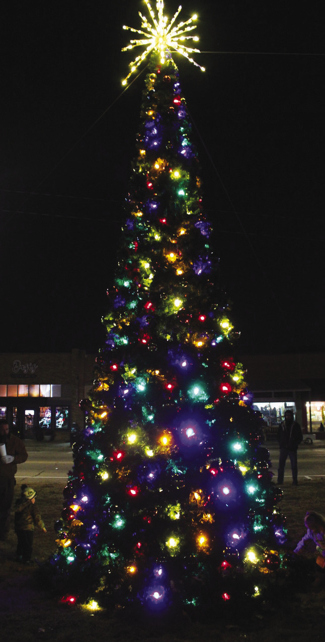 Thursday night’s annual Christmas tree lighting at the Stanley Tubbs Memorial Library in downtown Sallisaw featured a special holiday music performance by the Sallisaw Middle School choir, under the direction of Thesa Loving, along with free hot chocolate and colorful lighting displays. Your TIMES will publish photos of children’s visits with Santa Claus in the TIMES Christmas edition in December. LYNN MCCULLEY | TIMES