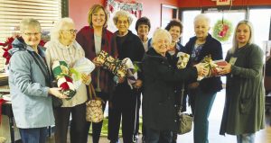 The Piecemakers donate quilts