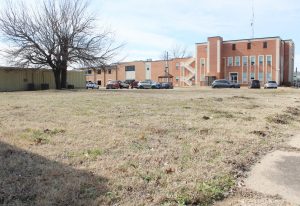 County purchases empty lot for more courthouse parking