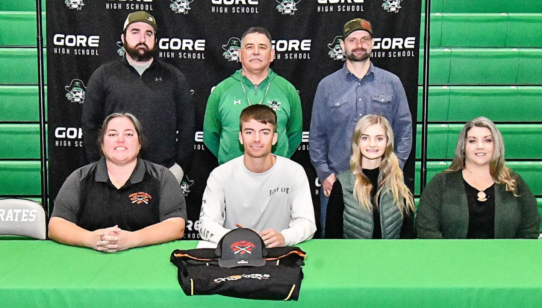 Blane Barnes signed a letter of intent Tuesday to continue his education at Connors State College, competing on the shotgun shooting team. On hand for the signing were (front, from left) CSC shooting coach Sierra Walker, Blane Barnes, LeeAnna Barnes, Sharlene Barnes, (back) Jonathan Lawrence, Martin Lincoln and Bucky Barnes. JIM CAMERON • TIMES