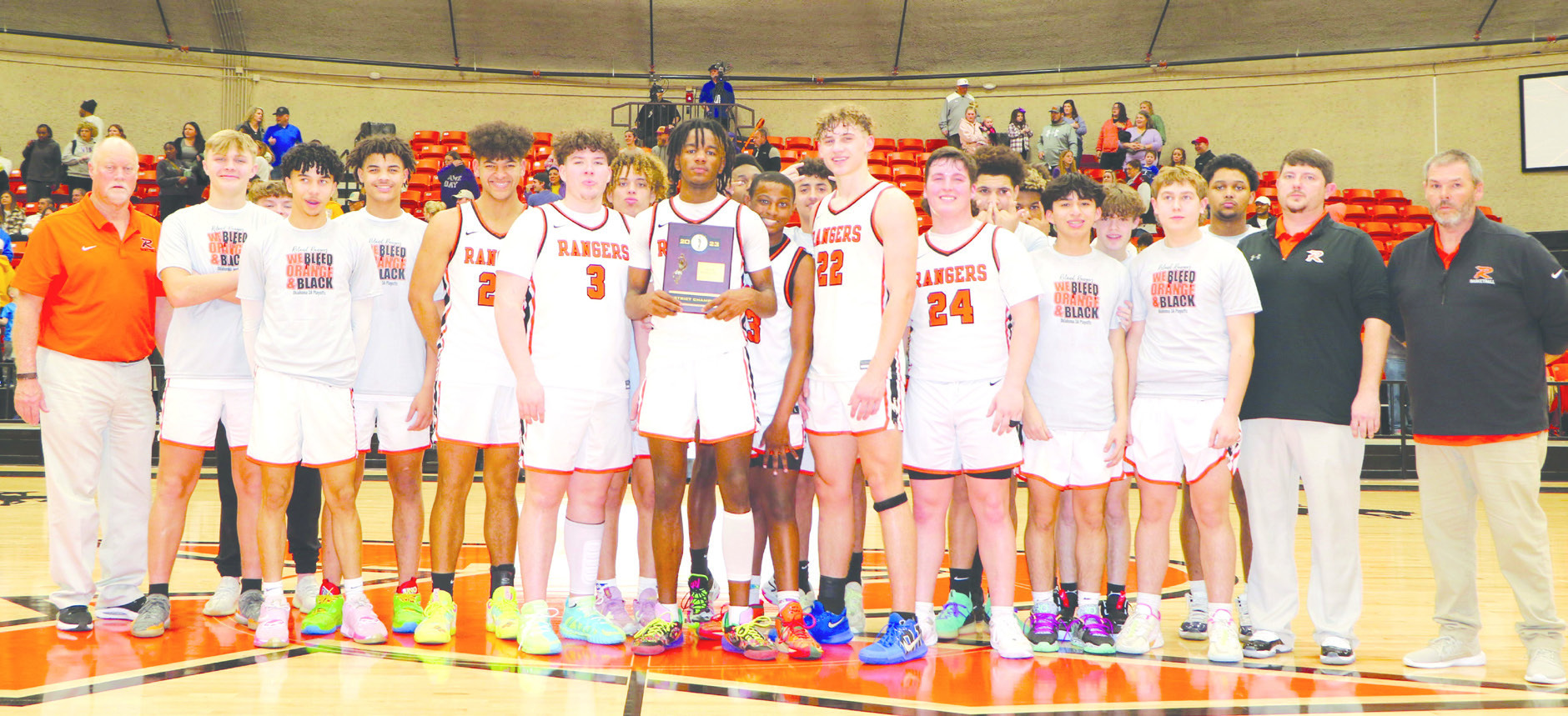 The Roland boys edged Vian 62-58 in double overtime Saturday night at Roland to claim the Class 3A, Area III, District 2 title. On Thursday at Roland the Rangers meet Stigler at 6:30 p.m. in a regional semifinal game and the Vian Wolverines play Eufaula at 3 p.m. in a regional consolation quarterfinal contest. LEA LESSLEY •TIMES