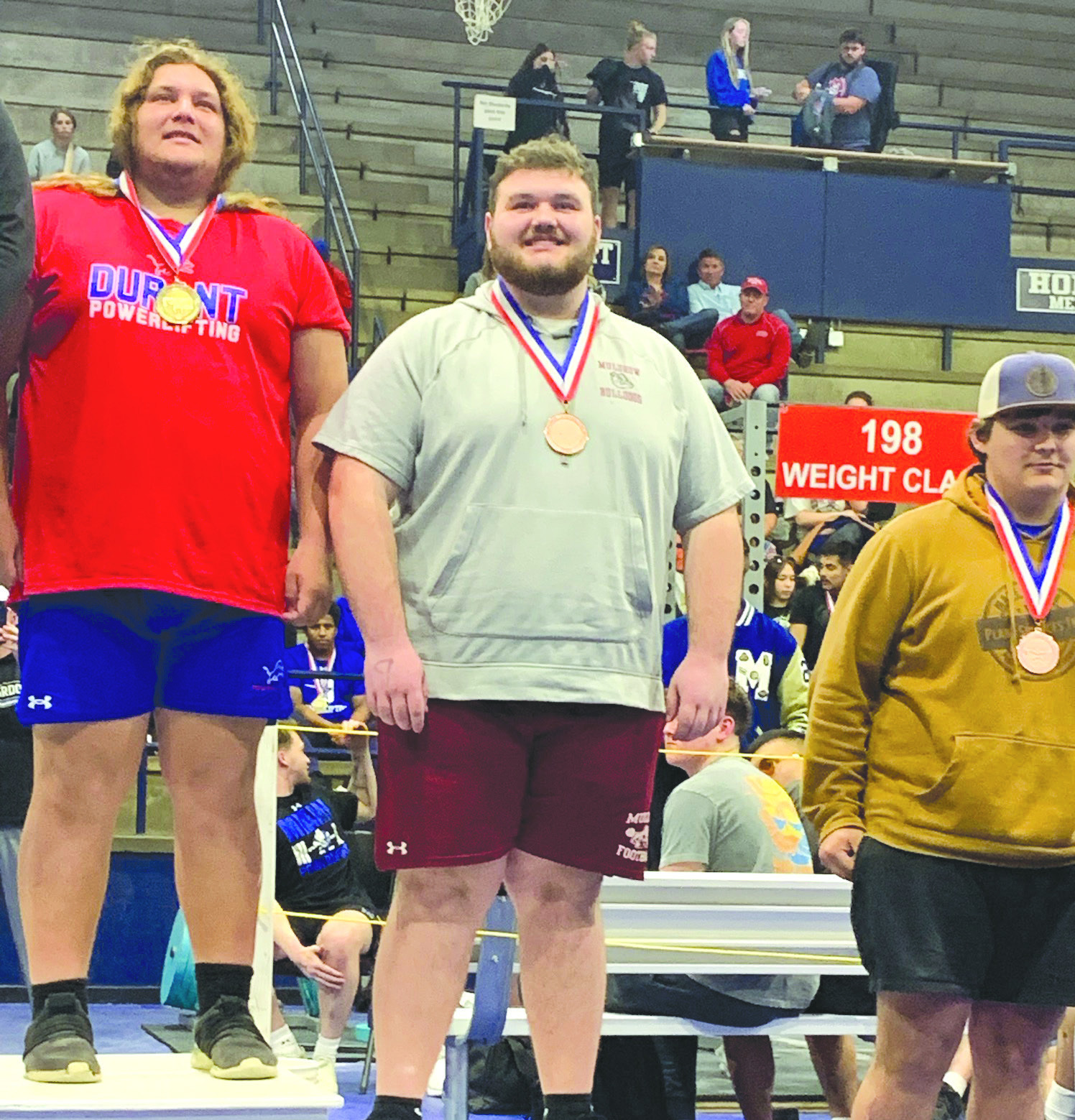 Muldrow High School’s Hayden Boyett (second from left) placed fourth Friday in the heavyweight division of the Class 3A powerlifting state meet at El Reno High School. Boyett scored nine points for the Bulldogs at the meet. SUBMITTED PHOTO