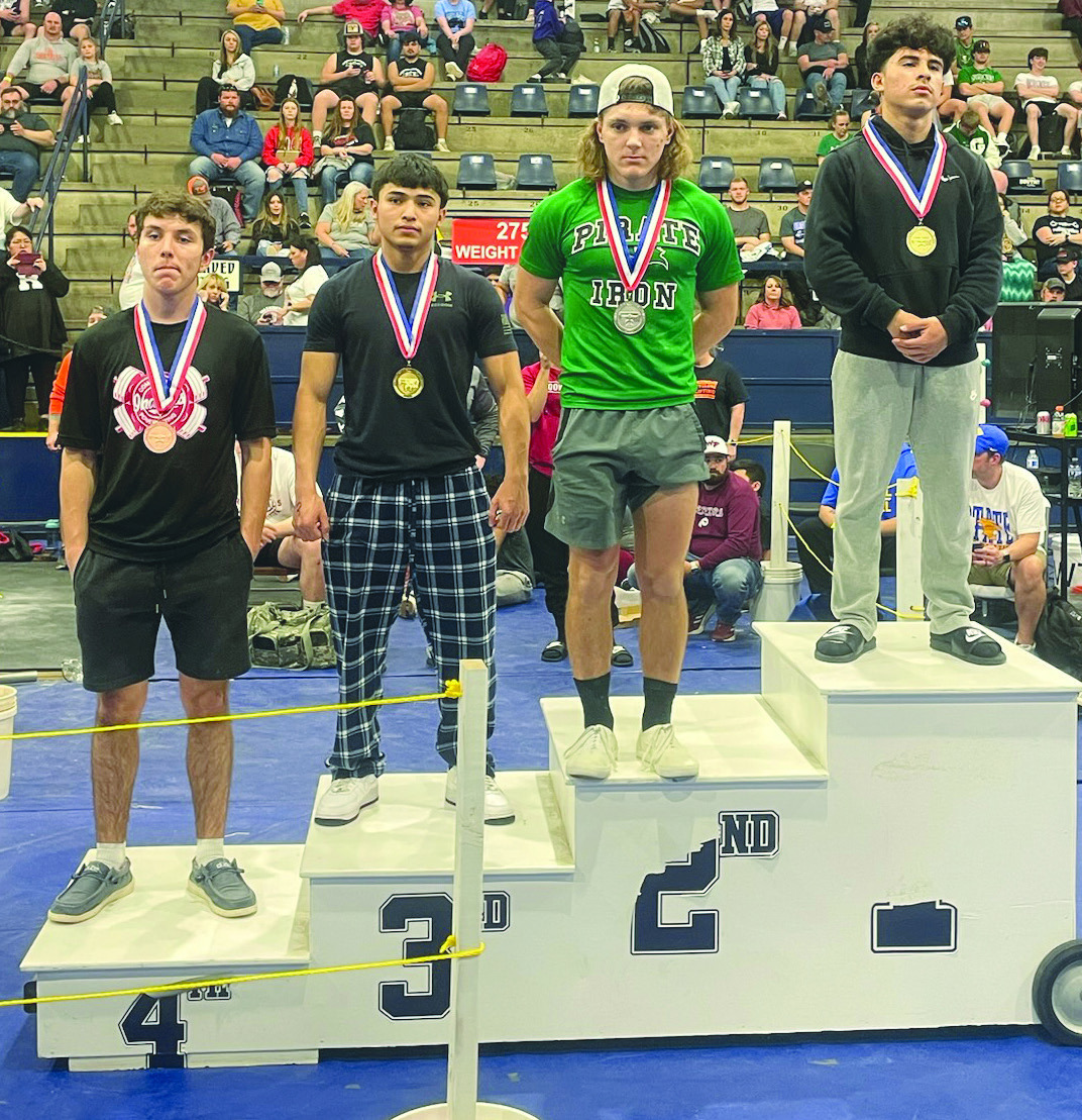 Gore senior Tyler Lane (third from left) placed second Saturday in the 145-pound weight division of the Class A powerlifting state meet at El Reno High School. Lane scored 26 points at the meet to help the Pirates win their second straight state title. SUBMITTED PHOTO