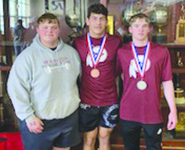 The Webbers Falls’ high school powerlifting team finished third Saturday in the Class B powerlifting state meet at El Reno High School. Pictured are (from left) David Barnes, Maddux Shelby and Gunner Carey. SUBMITTED PHOTO