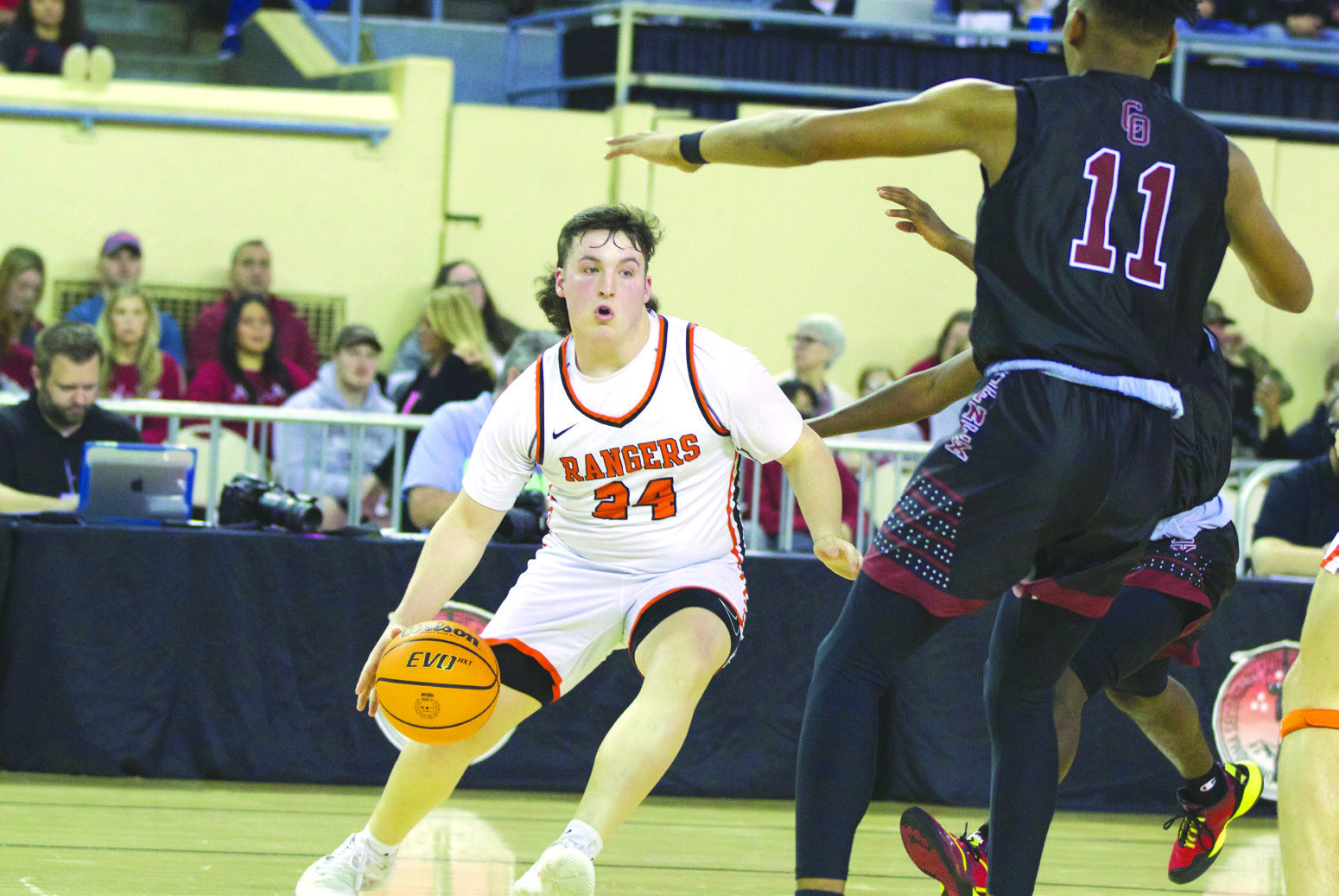 Roland junior Ashton Peters drives the baseline during Thursday’s Class 3A state tournament quarterfinal game against Crooked Oak inside Jim Norick Arena in Oklahoma City. A 62-46 setback to the eighth-ranked Ruf-Nex ended the fourth-ranked Rangers’ season. LEA LESSLEY •TIMES