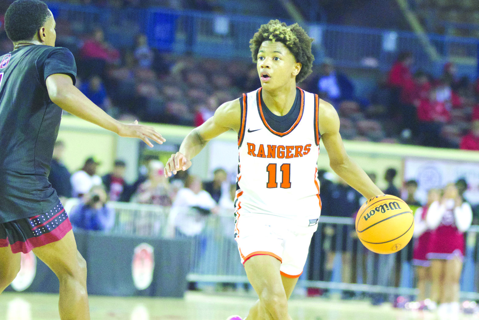 Roland freshman Davohn Hall sets up the offense during Thursday’s Class 3A state tournament quarterfinal contest against Crooked Oak at the State Fairgrounds. Hall totaled 11 points in the Rangers’ 62-46 loss to the Ruf-Nex. LEA LESSLEY •TIMES
