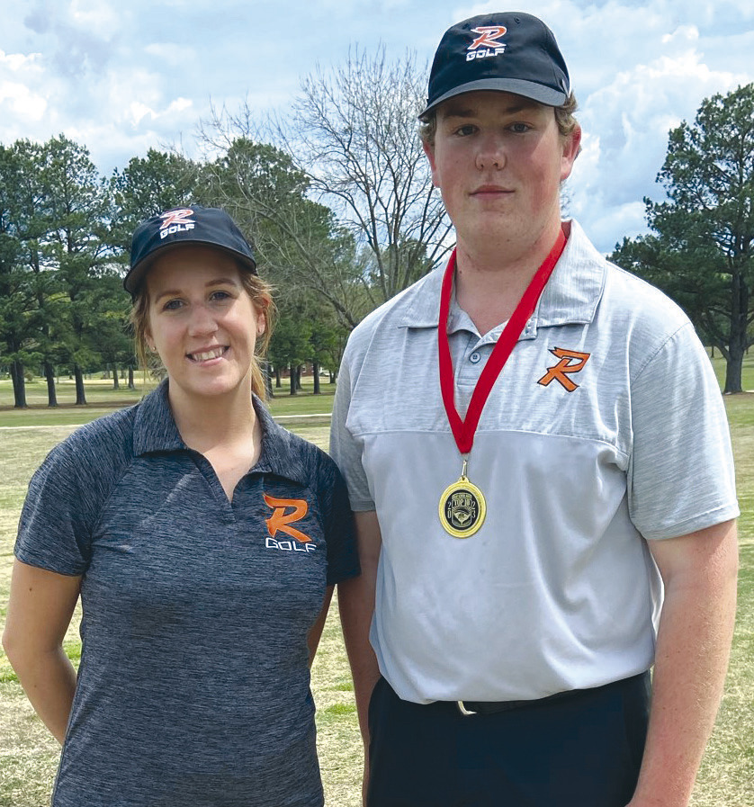 LEFT: Roland junior Lilly Medicine Bird (right) finished seventh Wednesday in the Poteau Girls’ Golf Tournament at Choctaw Country Club after shooting a 98. Also pictured is Roland coach Heather Moore. SUBMITTED PHOTO