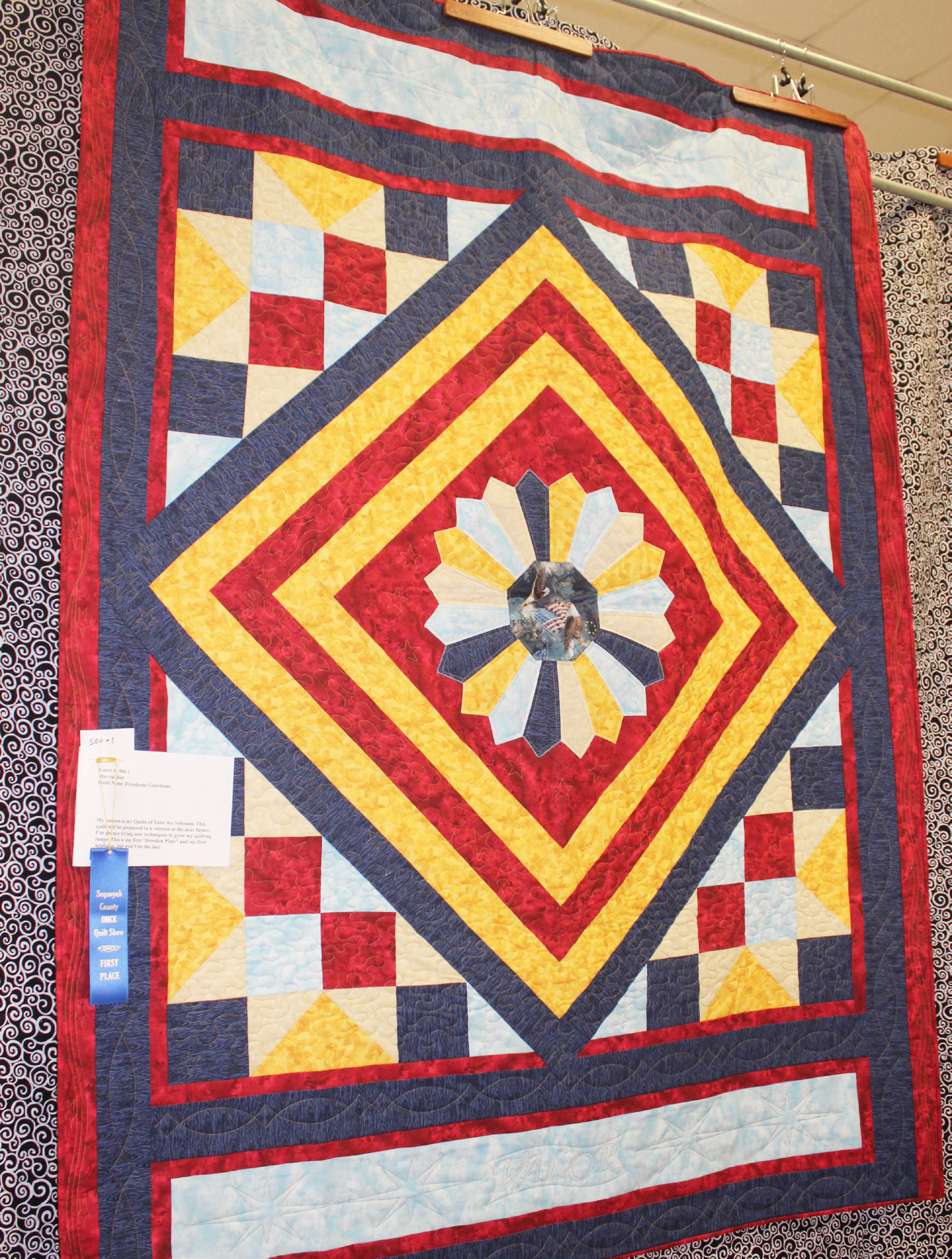 “Freedom Guardians” was the winner of a blue ribbon at the OHCE Quilt Show. The quilt, which received first place in the applique division was made by Marcia Beat. Beat said the quilt, inspired by her passion of “Quilts of Valor” for veterans, will be presented to a veteran in the near future.